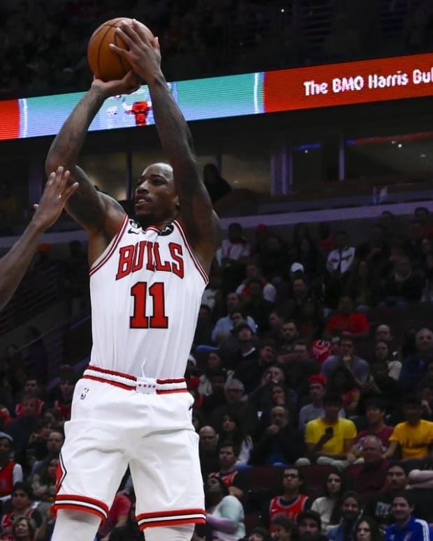 Oct 26, 2022; Chicago, Illinois, USA; Chicago Bulls forward DeMar DeRozan (11) shoots the ball over Indiana Pacers guard Bennedict Mathurin (00) during the first half at the United Center. Mandatory Credit: Matt Marton-USA TODAY Sports